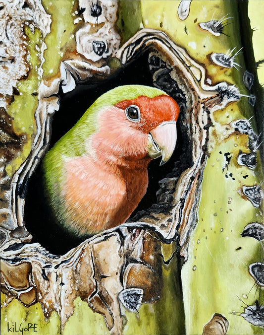 Painting of a parrot perched in a cactus hole